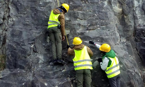 Participants examining a section of Numidian Flysch